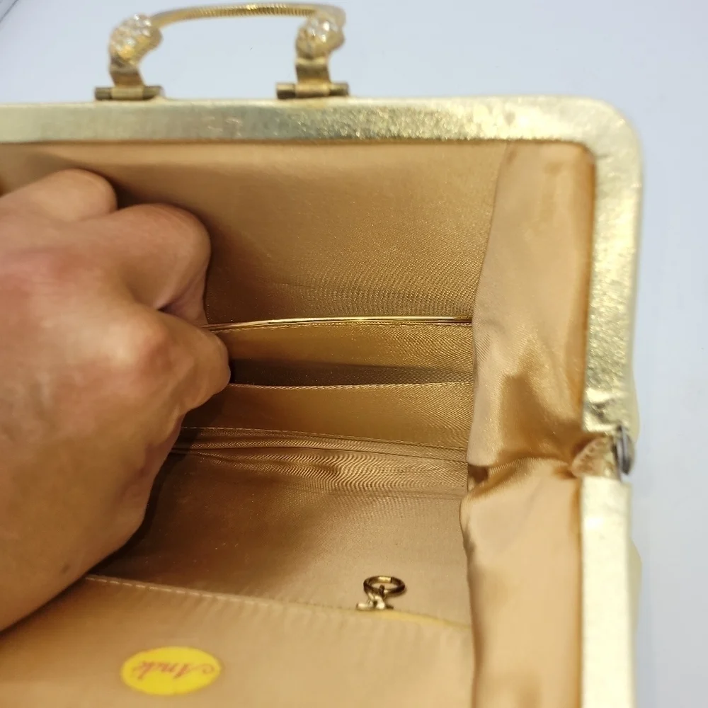 Vintage Andé Gold Clutch With Rhinestone Details Clasp.